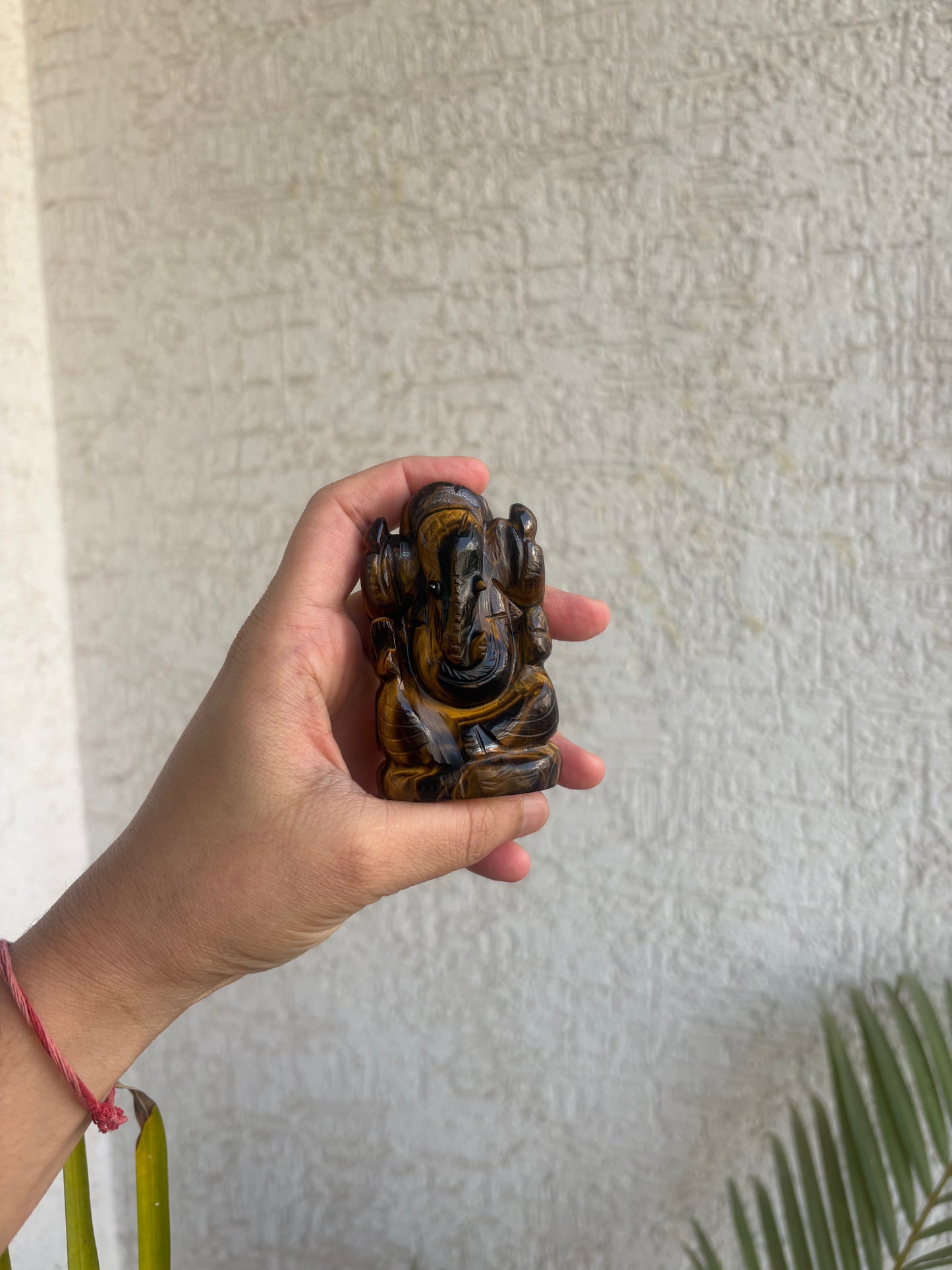 Hand Carved Tiger’s Eye Ganapati (131.23 Grams)
